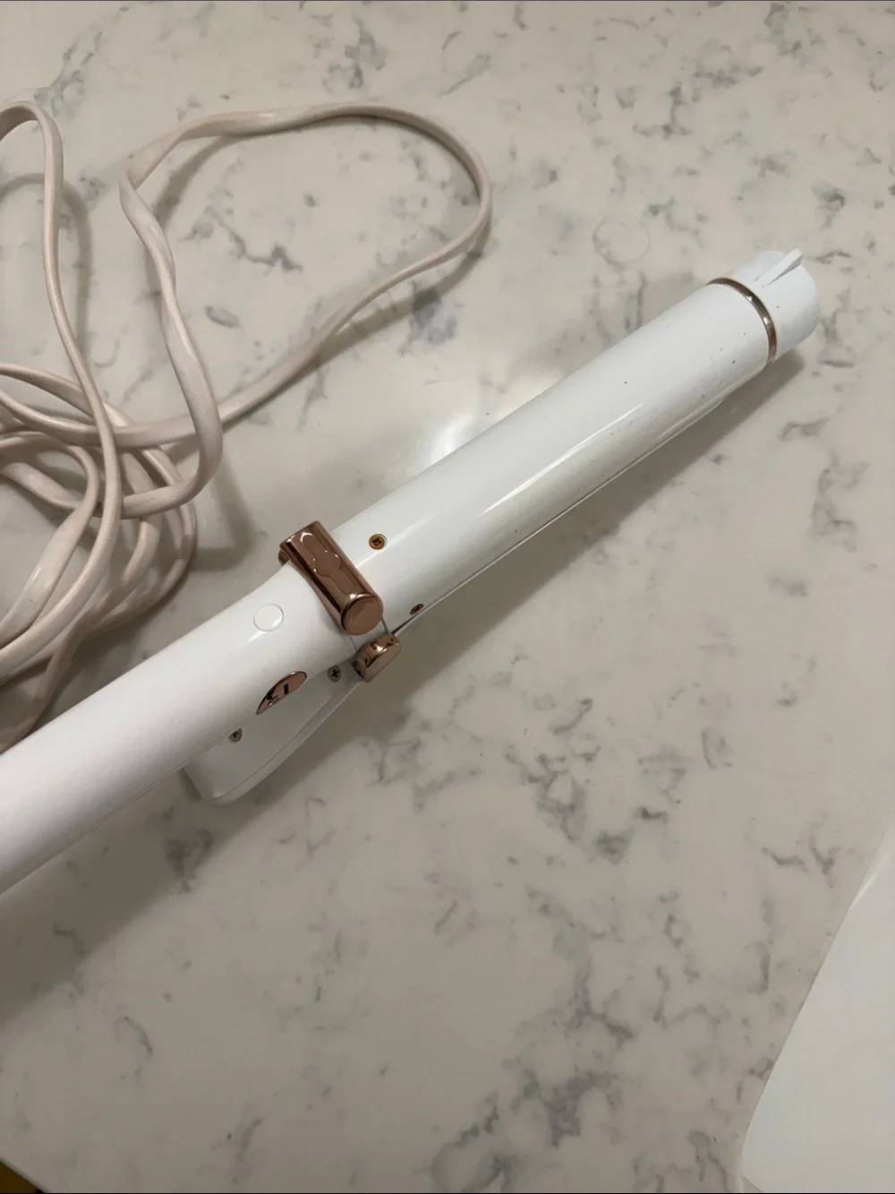 T3 Singlepass 1.25 inch ceramic curling iron in white and Rose Gold